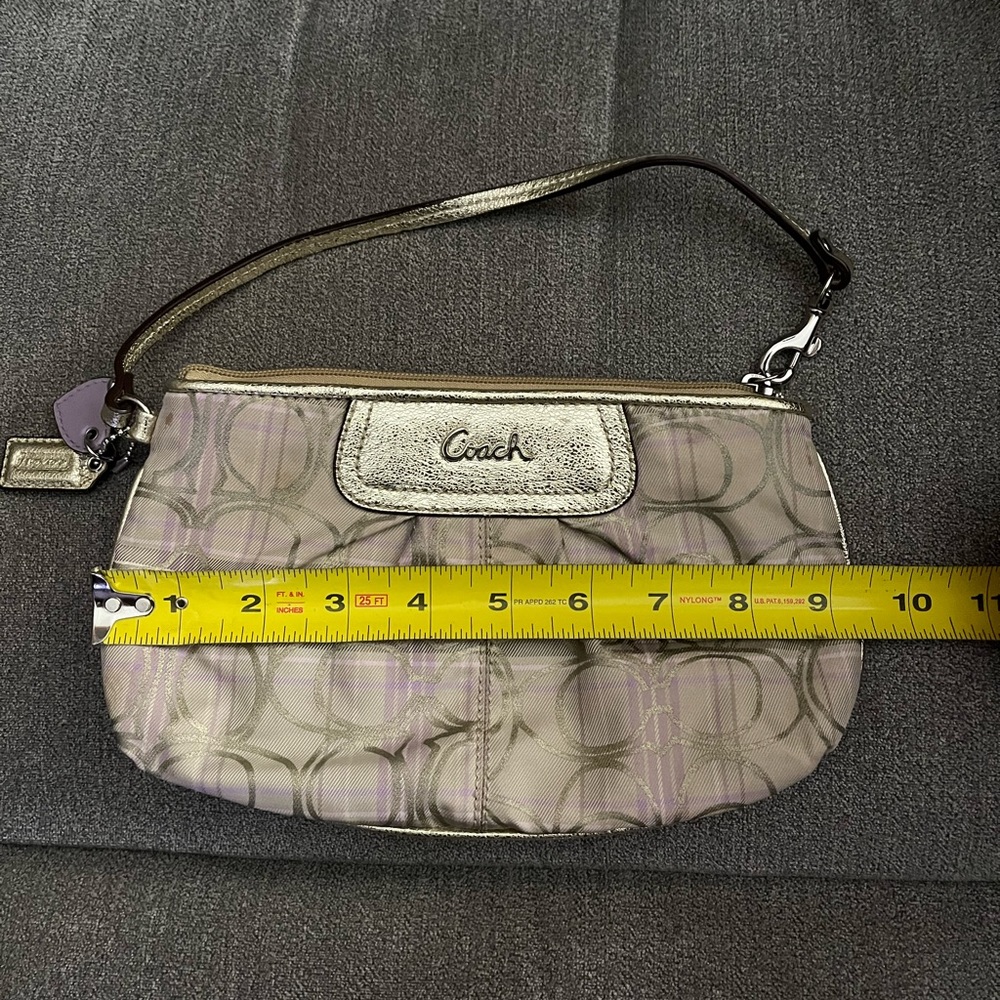 Signature coach wristlet